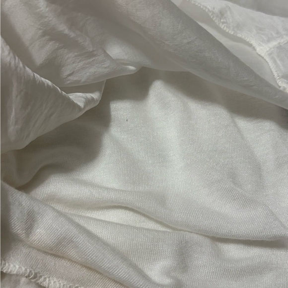 White silk made in Italy blouse. 3D flowers at v neckline. Ruffle front. - Picture 11 of 15